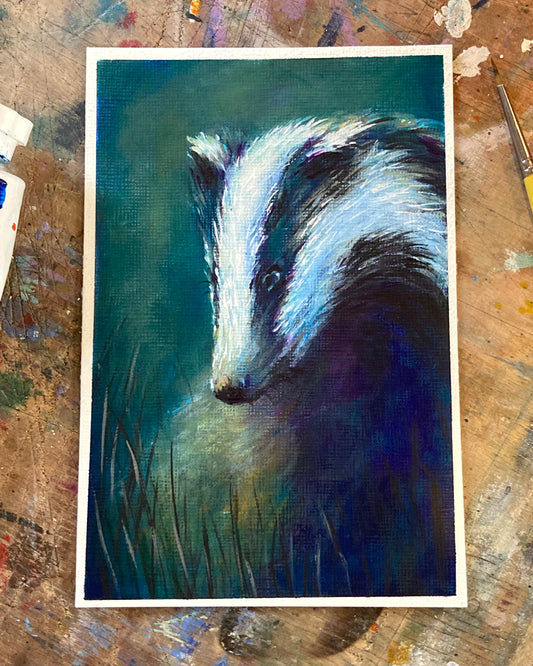 Badger in long grass